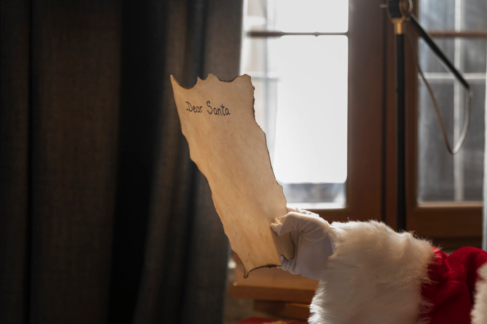 hand-santa-holding-letter-addressed-him
